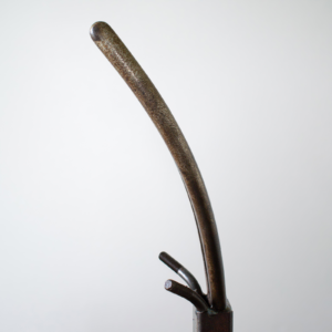 Detailed view of the curved plier horn used in a welded metal antelope sculpture.